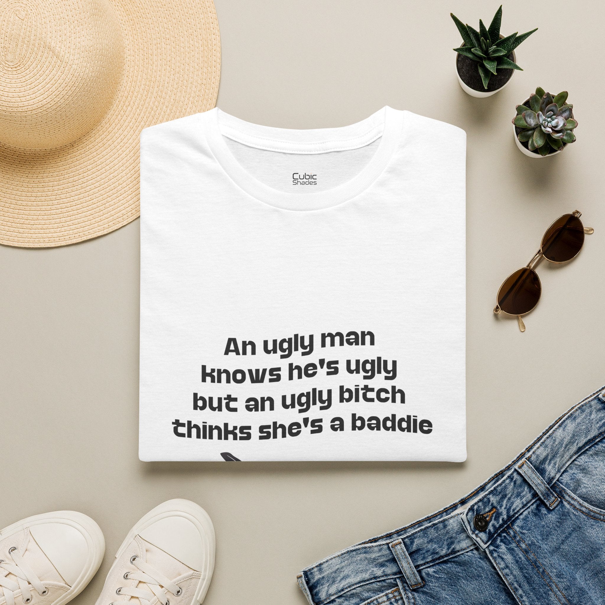 Graphic Tee — "An ugly man knows he's ugly but an ugly bitch thinks she's a baddie"