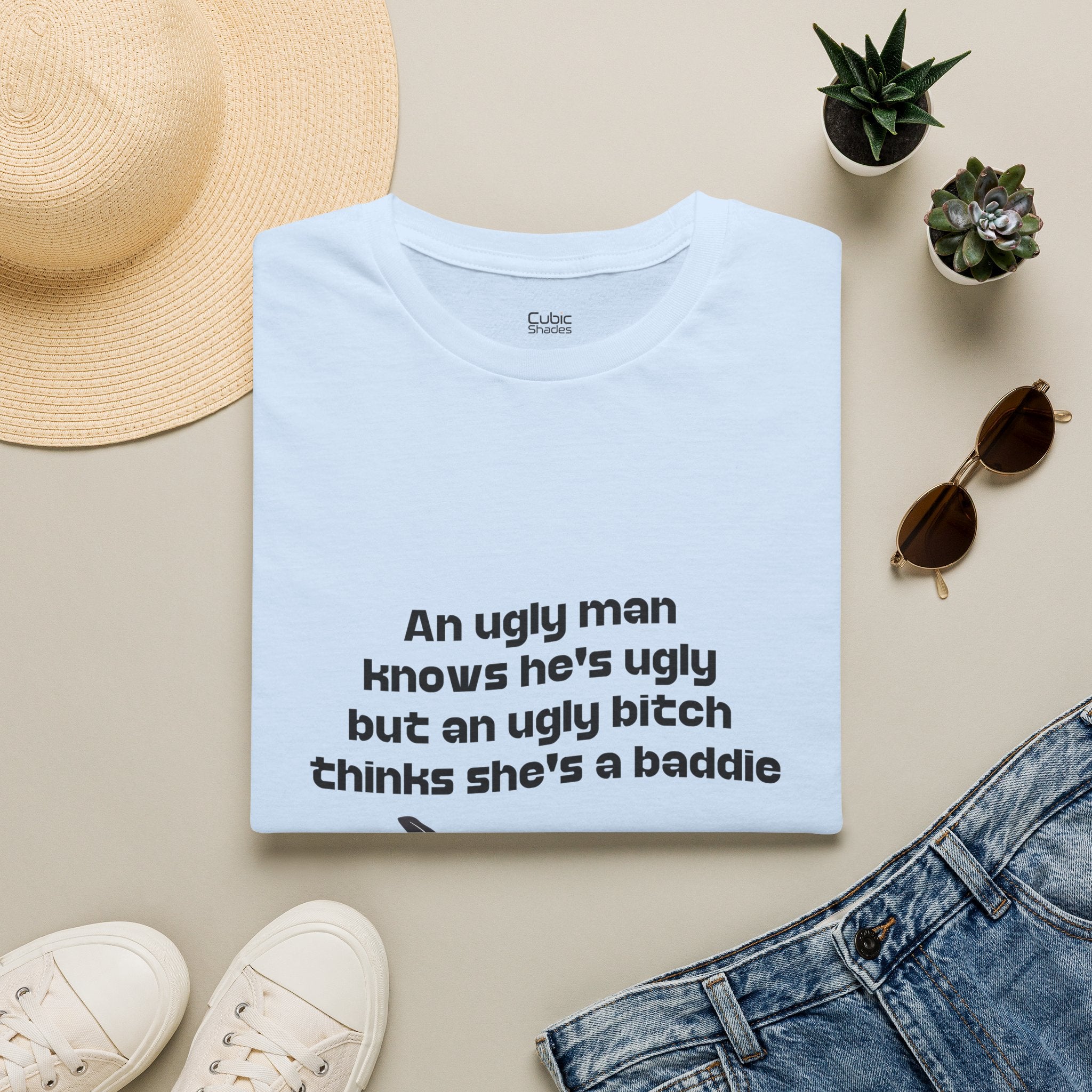 Graphic Tee — "An ugly man knows he's ugly but an ugly bitch thinks she's a baddie"