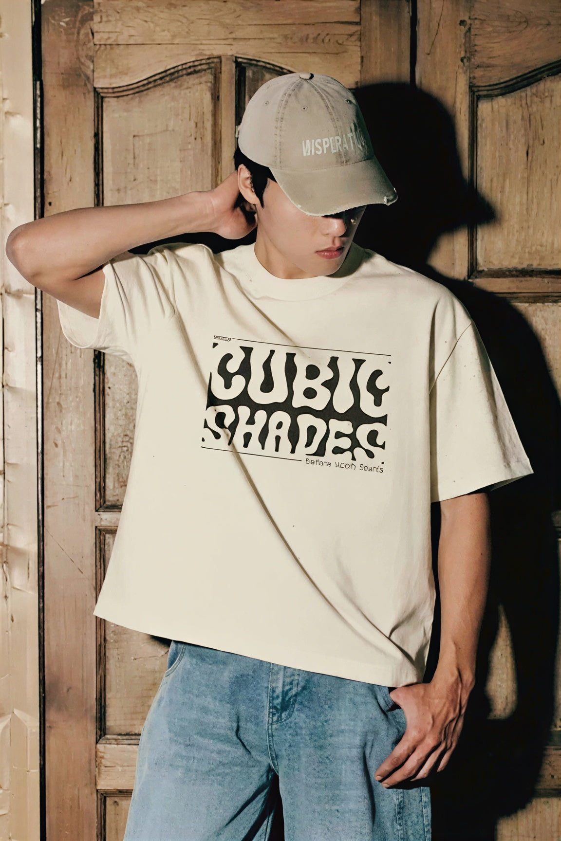 Cubic Shades graphic T-Shirt | retro wavy text, cream tee