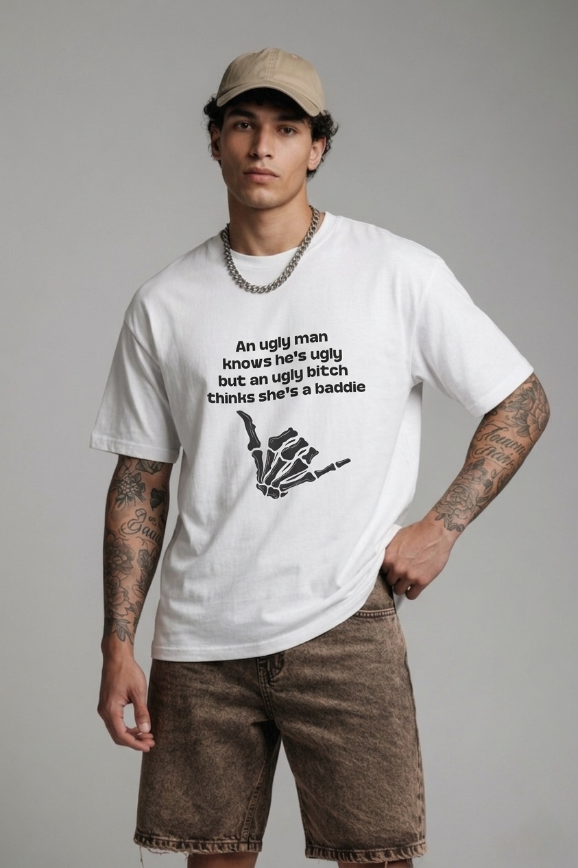 Graphic Tee — "An ugly man knows he's ugly but an ugly bitch thinks she's a baddie"
